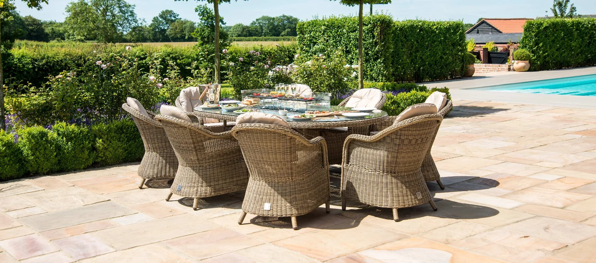 Maze Winchester 8 Seat Oval Fire Pit Dining Set With Heritage Chairs