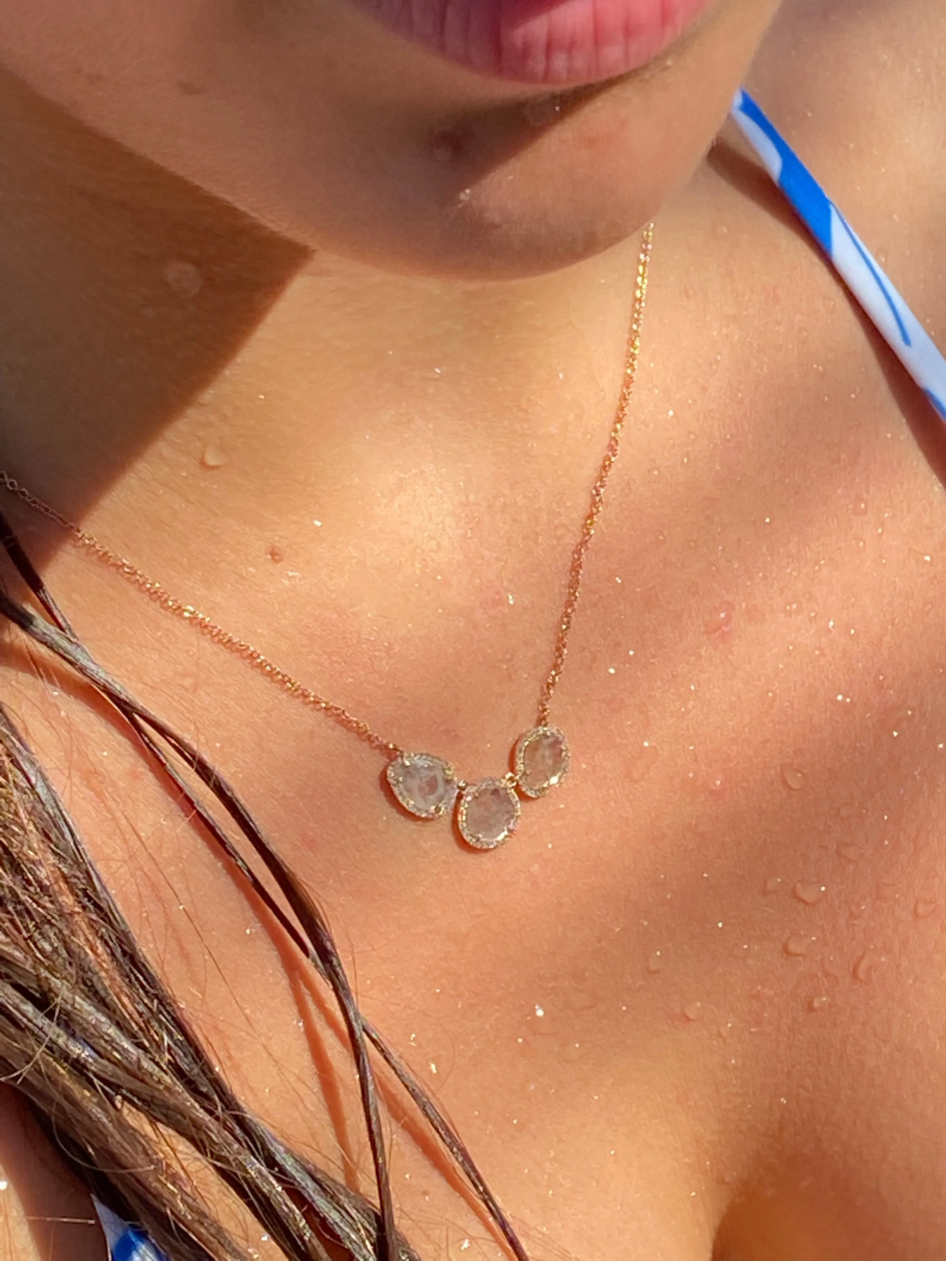 SLICED DIAMOND NECKLACE WITH DIAMOND SURROUND